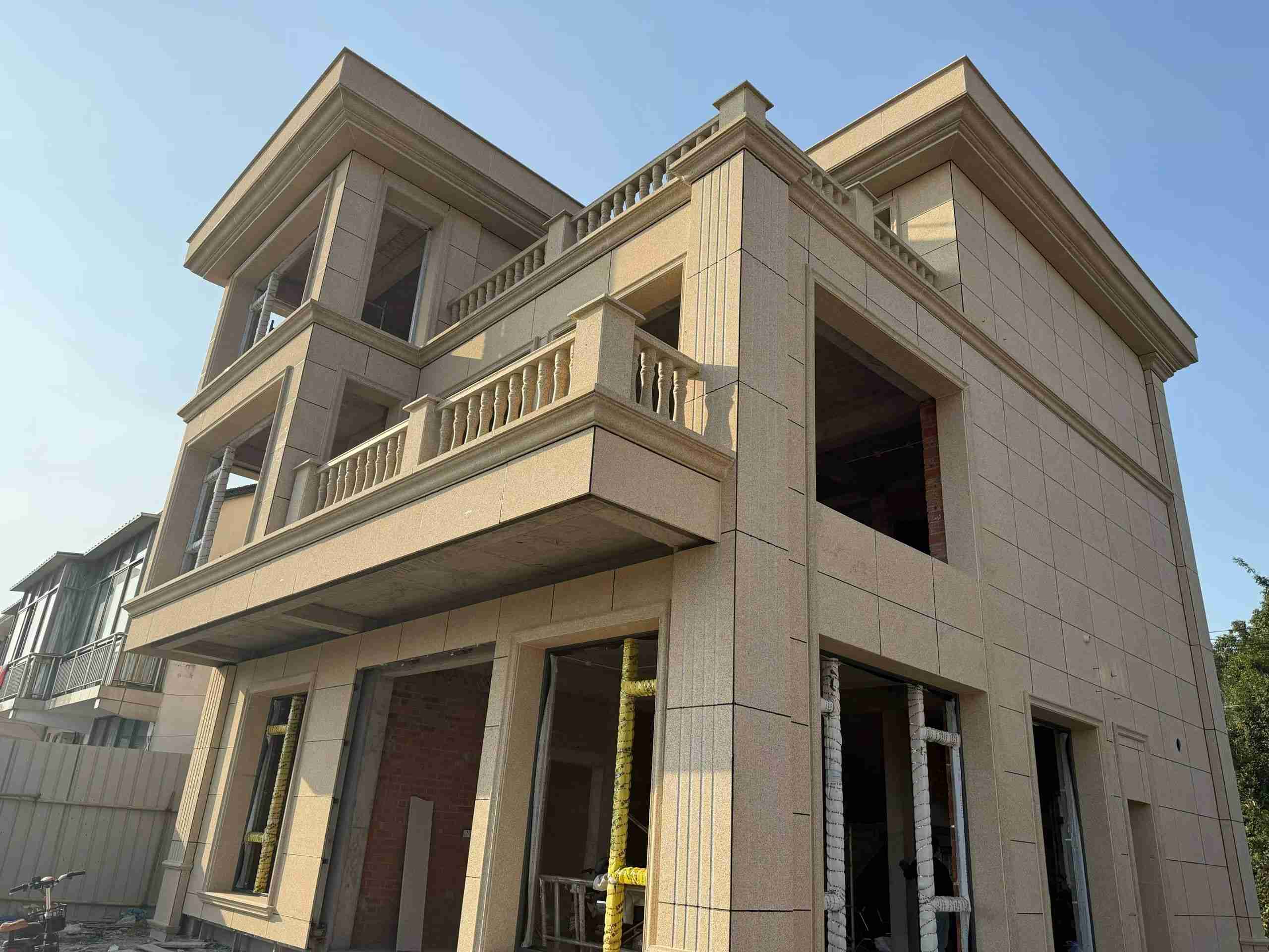 淮南 黄金麻花岗岩石材荔枝面外墙干挂效果展示